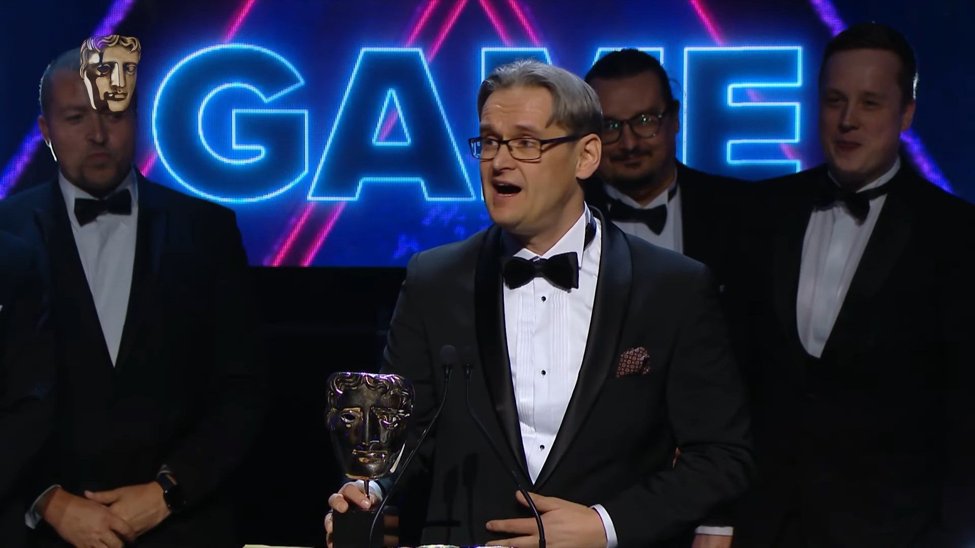 Kuittinen Proudly Accepts the Award